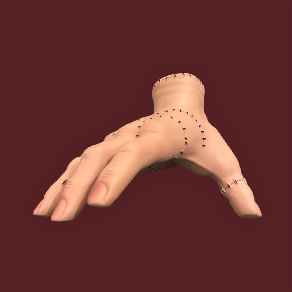 Wednesday Addam Thing Hand